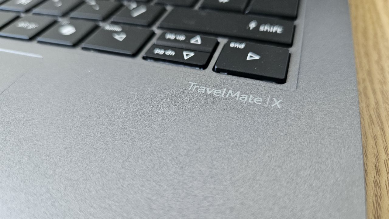The Acer TravelMate X14 AI on a desk