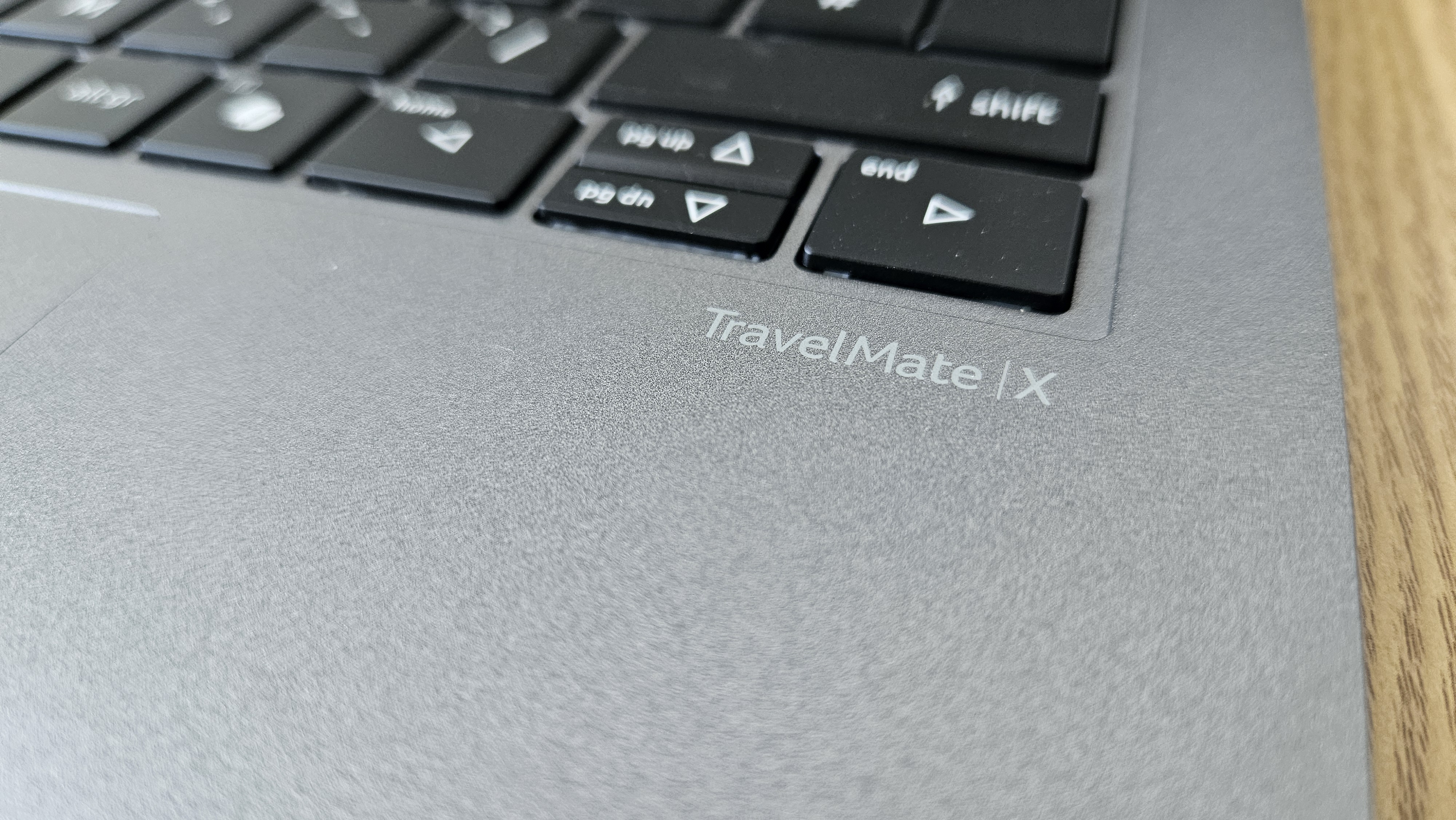 The Acer TravelMate X14 AI on a desk