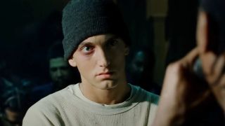 Eminem looking at his opponent in a rap battle in 8 Mile.