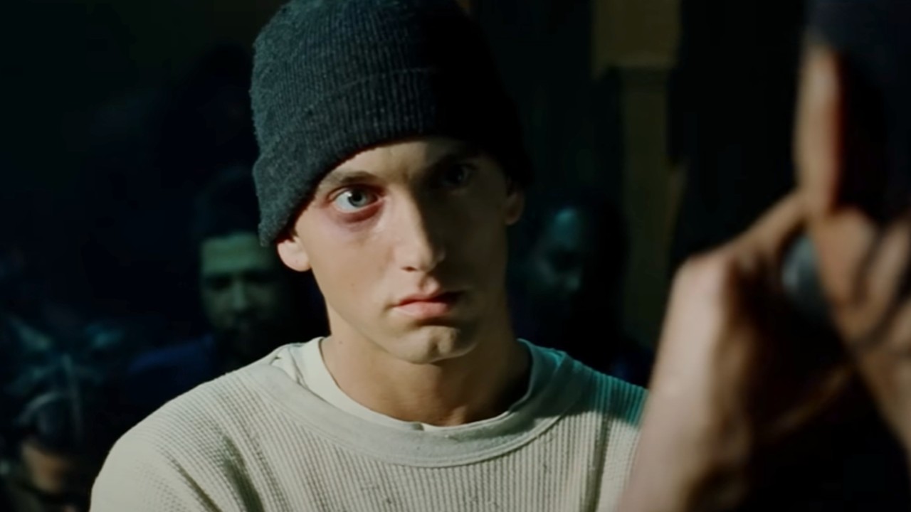 Eminem looking at his opponent in a rap battle in 8 Mile.