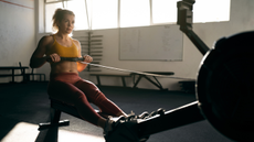 Woman doing a rowing machine workout