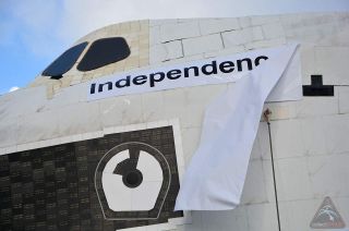 The new name for Space Center Houston's full-size space shuttle replica, Independence, is unveiled, Oct. 5, 2013.