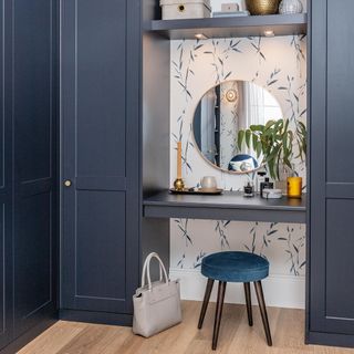 Fitted furniture with a dressing table, stool and mirror
