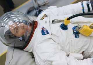 Swigert in his space suit at the Kennedy Space Center just prior to the launch of Apollo 13.