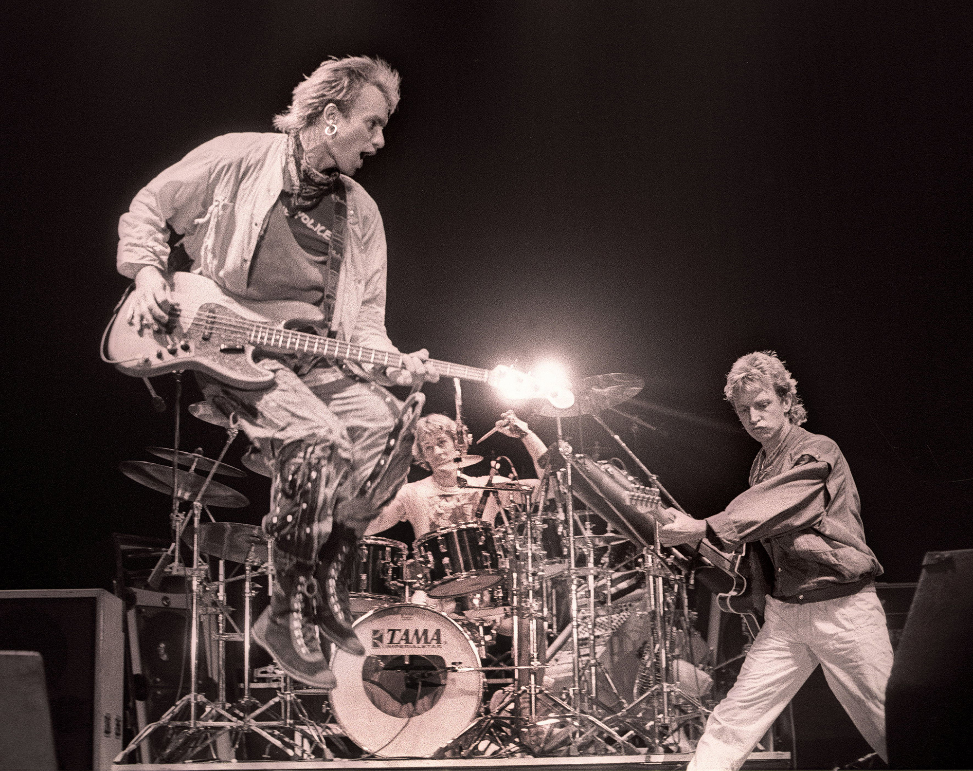 Photo of POLICE and Stewart COPELAND and STING and Andy SUMMERS, L-R: Sting (playing Fender Jazz bass), Stewart Copeland, Andy Summers performing live onstage, at Ahoy, in Rotterdam, Netherlands, 04 October, 1983