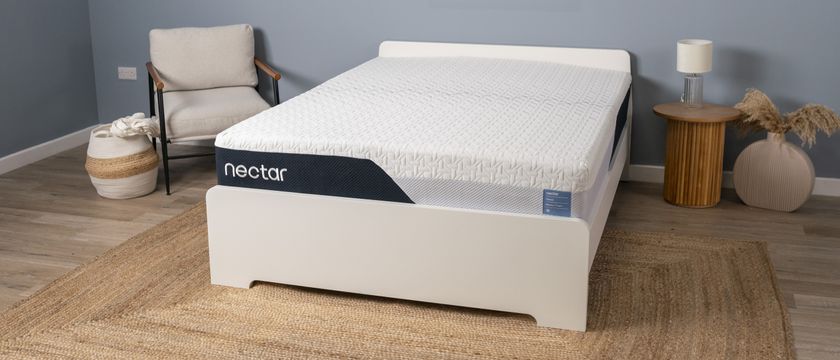 The Nectar Classic Memory Foam Mattress on a bed frame in a bedroom