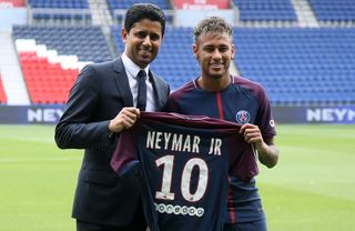Neymar Jr of Brazil - here with President of PSG Nasser Al-Khelaifi - during press conference and jersey presentation following his signing as new player of Paris Saint-Germain at Parc des Princes on August 4, 2017 in Paris, France. (Photo by Jean Catuffe/Getty Images) The most expensive transfers ever