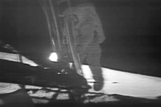 NASA astronaut Buzz Aldrin climbs down steps of Lunar Module (LM) on July 20, 1969