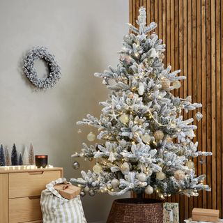 Marks & Spencer pre-lit artificial Christmas tree with fake snow