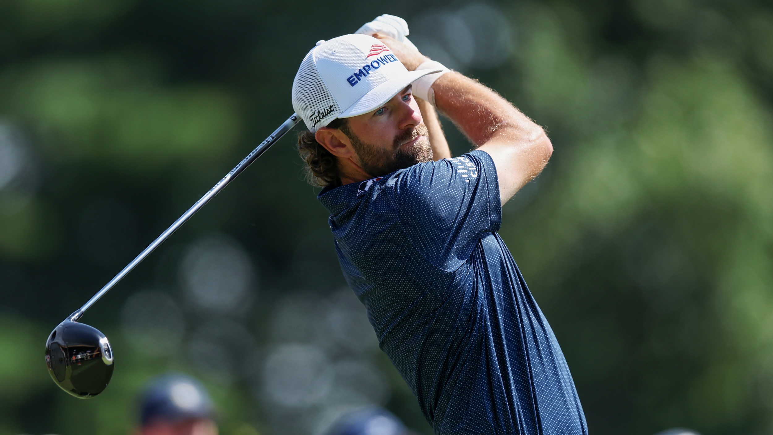 Cameron Young holds his finish on a drive