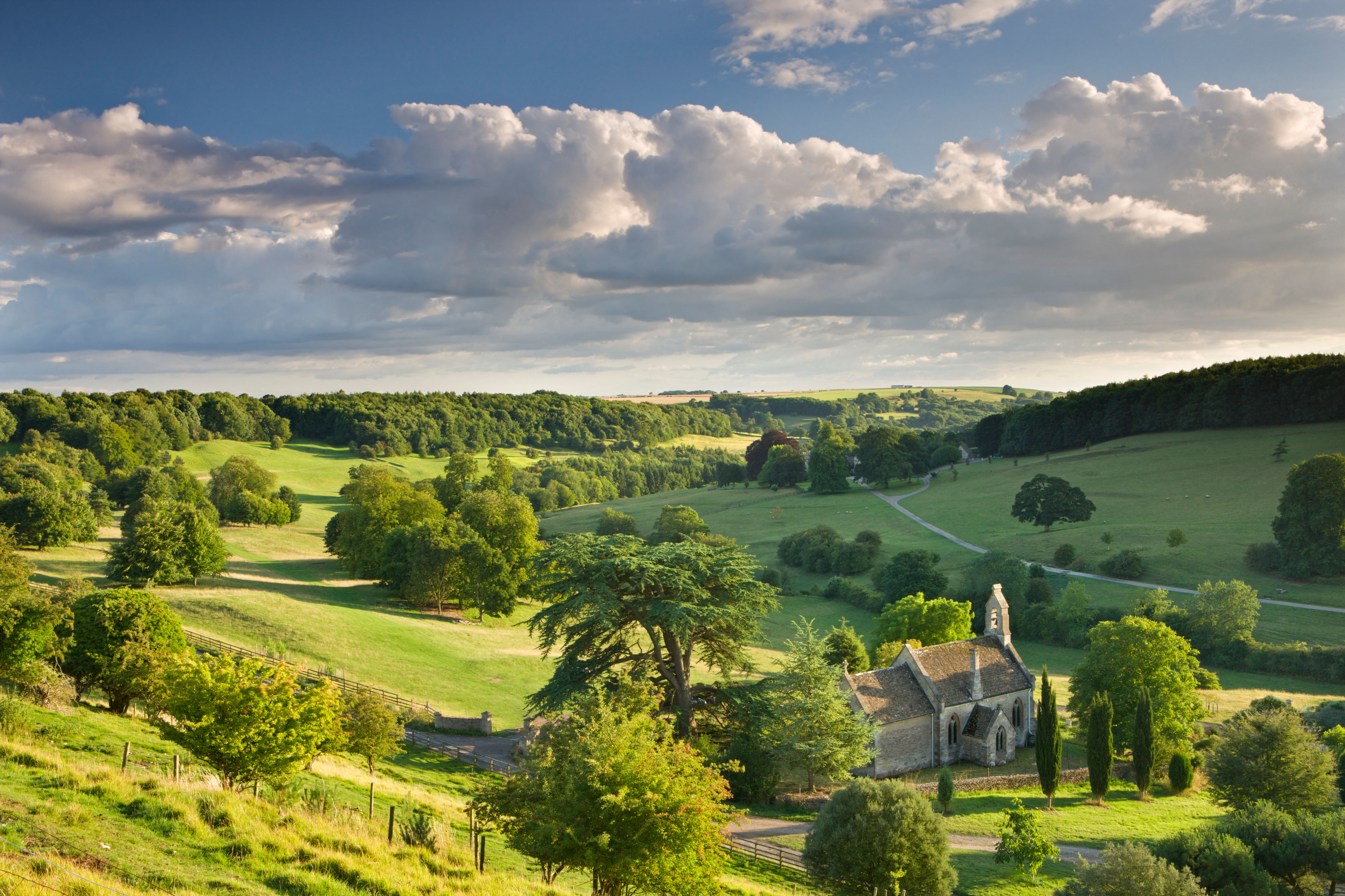 Church of St Mary the Virgin surrounded by beautiful countryside, Lasborough in the Cotswolds, Gloucestershire, England.