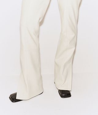 Model wearing white pant