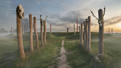 We see an illustration of a shaman in the background on a earthen mound holding up their hands. There are wooden poles with animal skulls making a path to the foreground.
