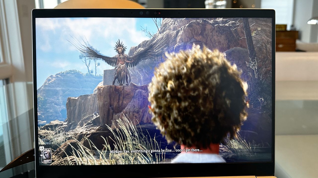 Razer Blade 14 (early 2024) showing a game on the display.