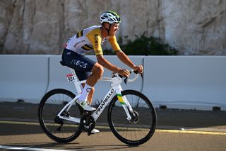 Luke Plapp (Ineos Grenadiers) fighting to retain his second place overall on the slopes of Jebel Hafeet on the final stage of the UAE Tour 2023