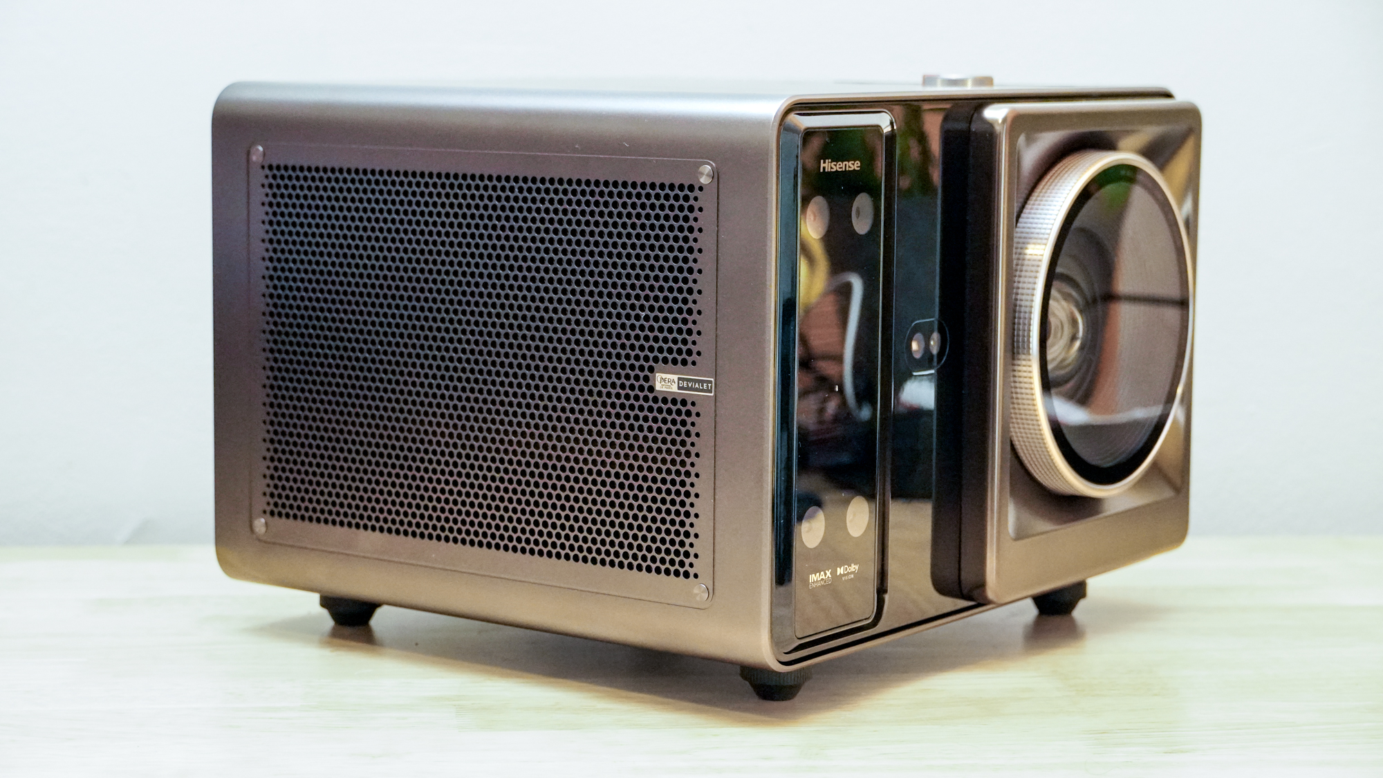 A Hisense XR10 Projector on a table