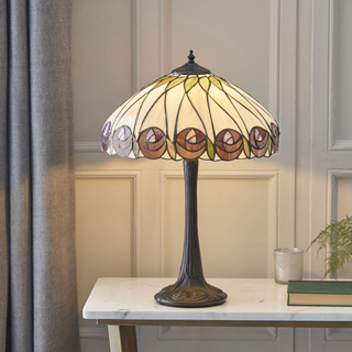 Tiffany Hutchinson Table Lamp on marble top side table.