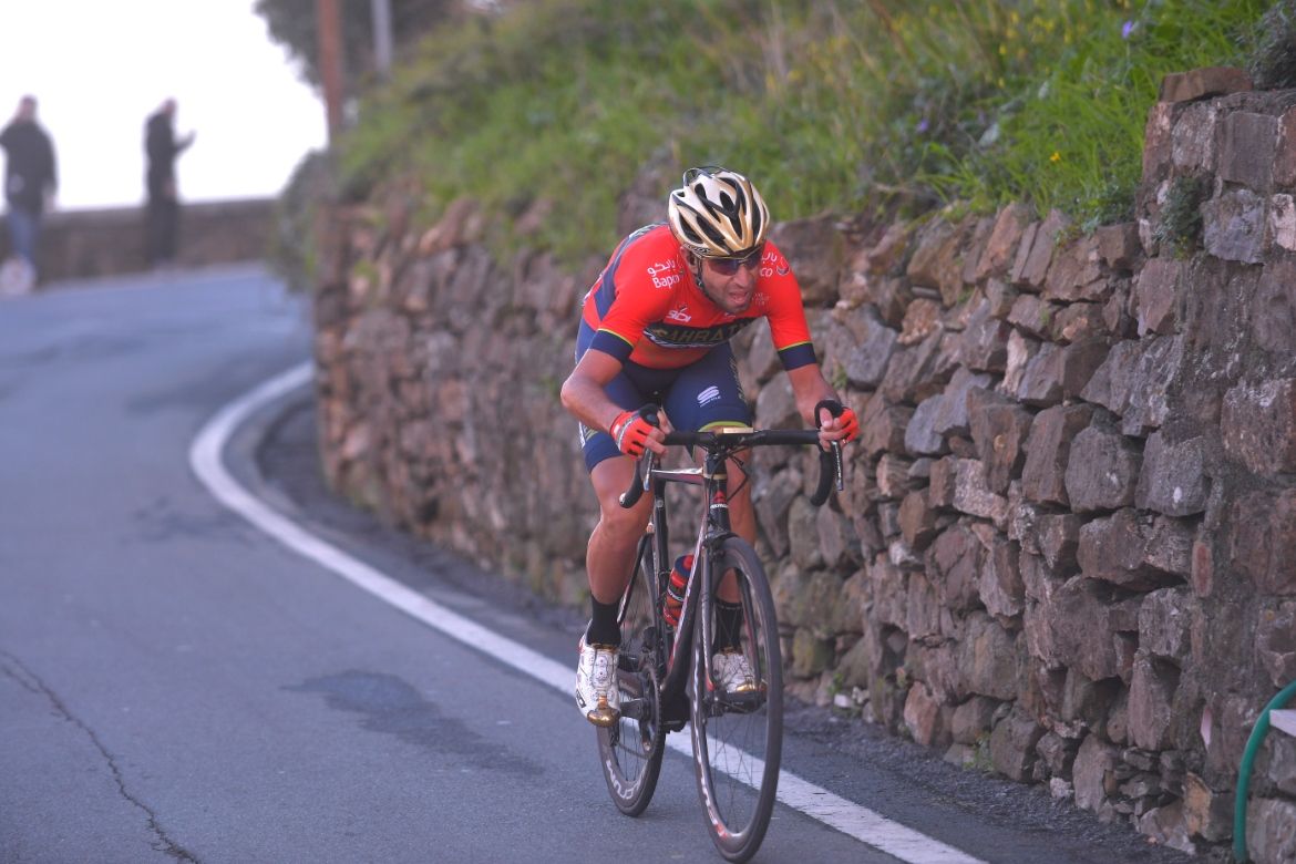 Vincenzo Nibali (Bahrain-Merida) makes it over the top of the Poggio alone