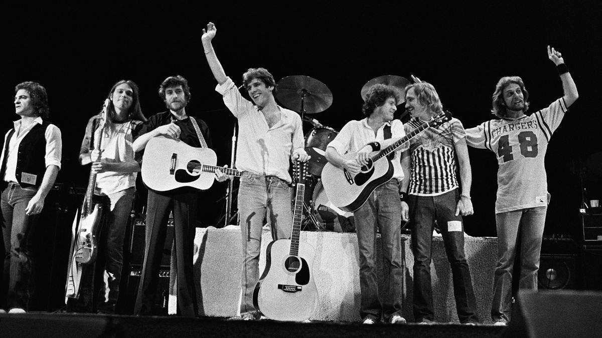 Eagles (L-R) Joe Vitale, Timothy B. Schmit, J.D. Souther, Glenn Frey, Don Henley, Joe Walsh and Don Felder following their performance at the San Diego Sports Arena in San Diego, California, December 1979. The concert was a benefit for Jerry Brown, who was running for president at the time.