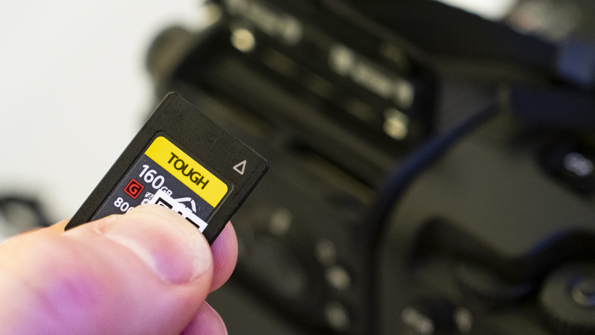 CFexpress Type-A card in the hand ready to go in the Sony A9 III