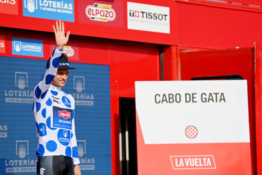 CABO DE GATA SPAIN AUGUST 31 Jay Vine of Australia and Team AlpecinDeceuninck celebrates winning the Polka dot mountain jersey on the podium ceremony after the 77th Tour of Spain 2022 Stage 11 a 1912km stage from ElPozo Alimentacin Alhama de Murcia to Cabo de Gata LaVuelta22 WorldTour on August 31 2022 in Cabo de Gata Spain Photo by Justin SetterfieldGetty Images