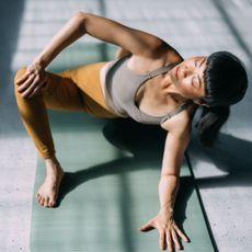 Best mobility exercises: A woman stretching