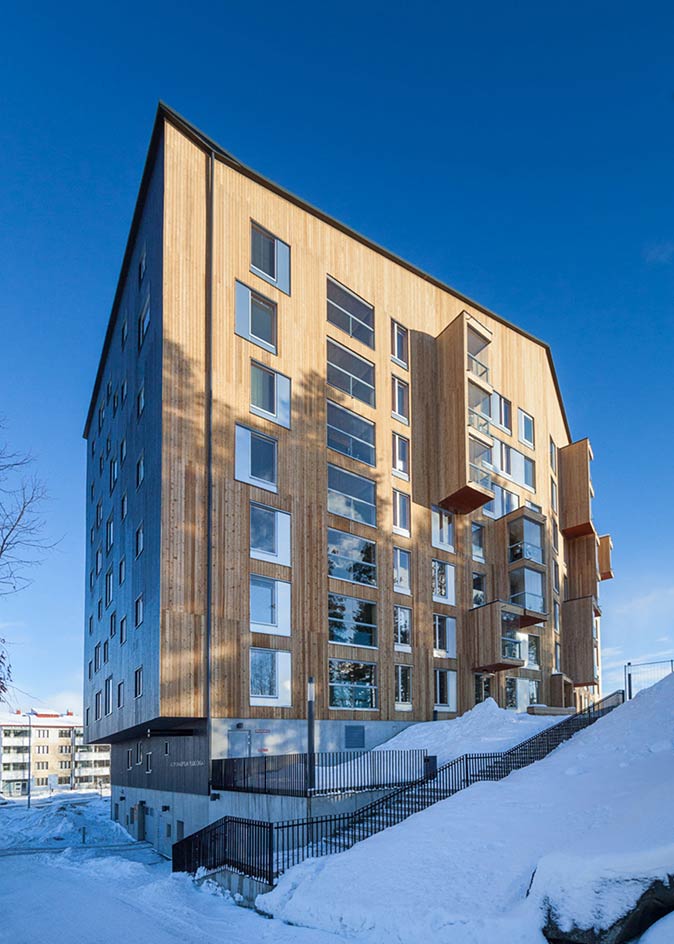 A view of a building outside with snow