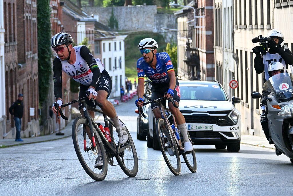 BINCHE BELGIUM OCTOBER 03 LR Ryan Gibbons of South Africa and UAE Team Emirates and Dries De Bondt of Belgium and Team AlpecinDeceuninck compete in the breakaway during the 36th Binche Chimay Binche Mmorial Frank Vandenbroucke 2023 a 1986km one day race from Binche to Binche UCIWT on October 03 2023 in Binche Belgium Photo by Luc ClaessenGetty Images