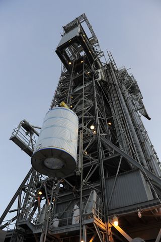 NASA hoists the twin Gravity Recovery and Interior Laboratory (GRAIL) spacecraft to the top of their launch pad at Space Launch Complex 17B at Cape Canaveral Air Force Station in Florida.