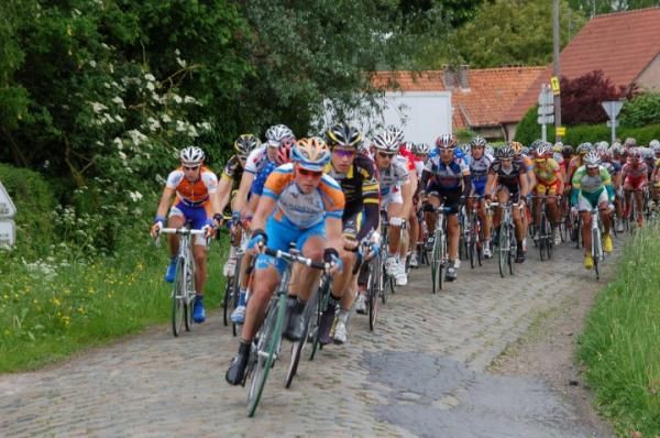 Riders negotiate a cobbled turn during the U23 Paris-Roubaix.