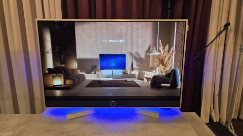 Loewe Stellar TV with a living room arrangement on screen