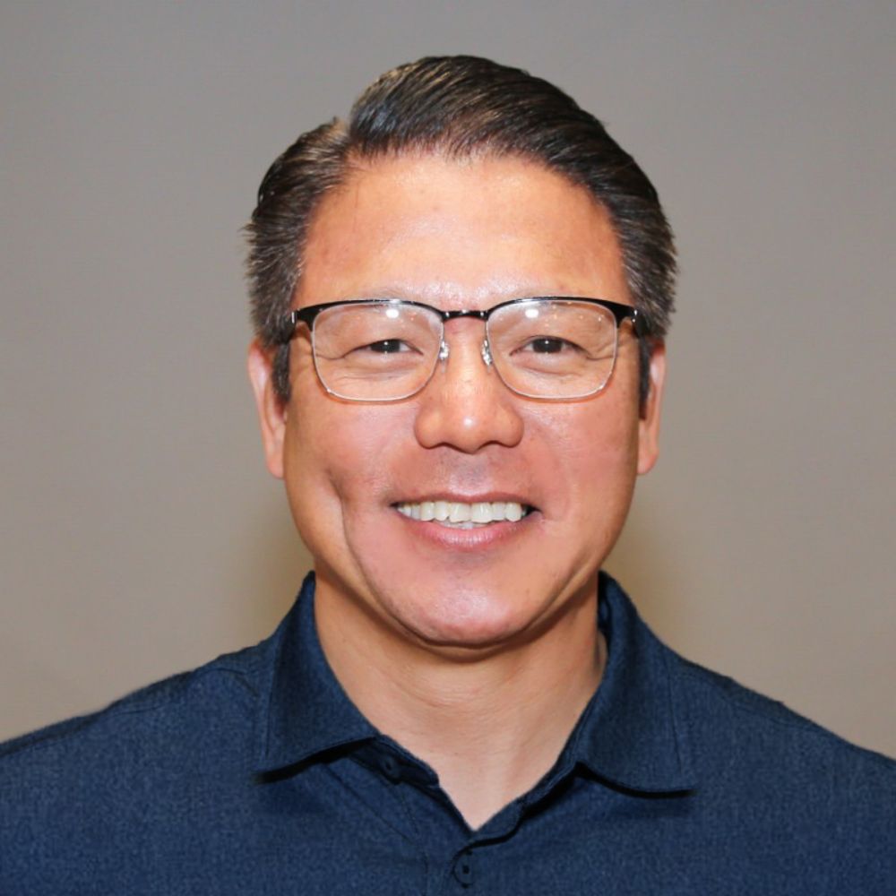 A headshot of Ed Edrosa