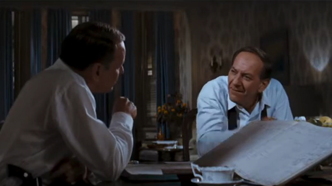 Frank Sinatra with his side to the camera, talking to Jack Klugman in The Detective