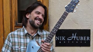 Nik Huber pictured with one of his guitars