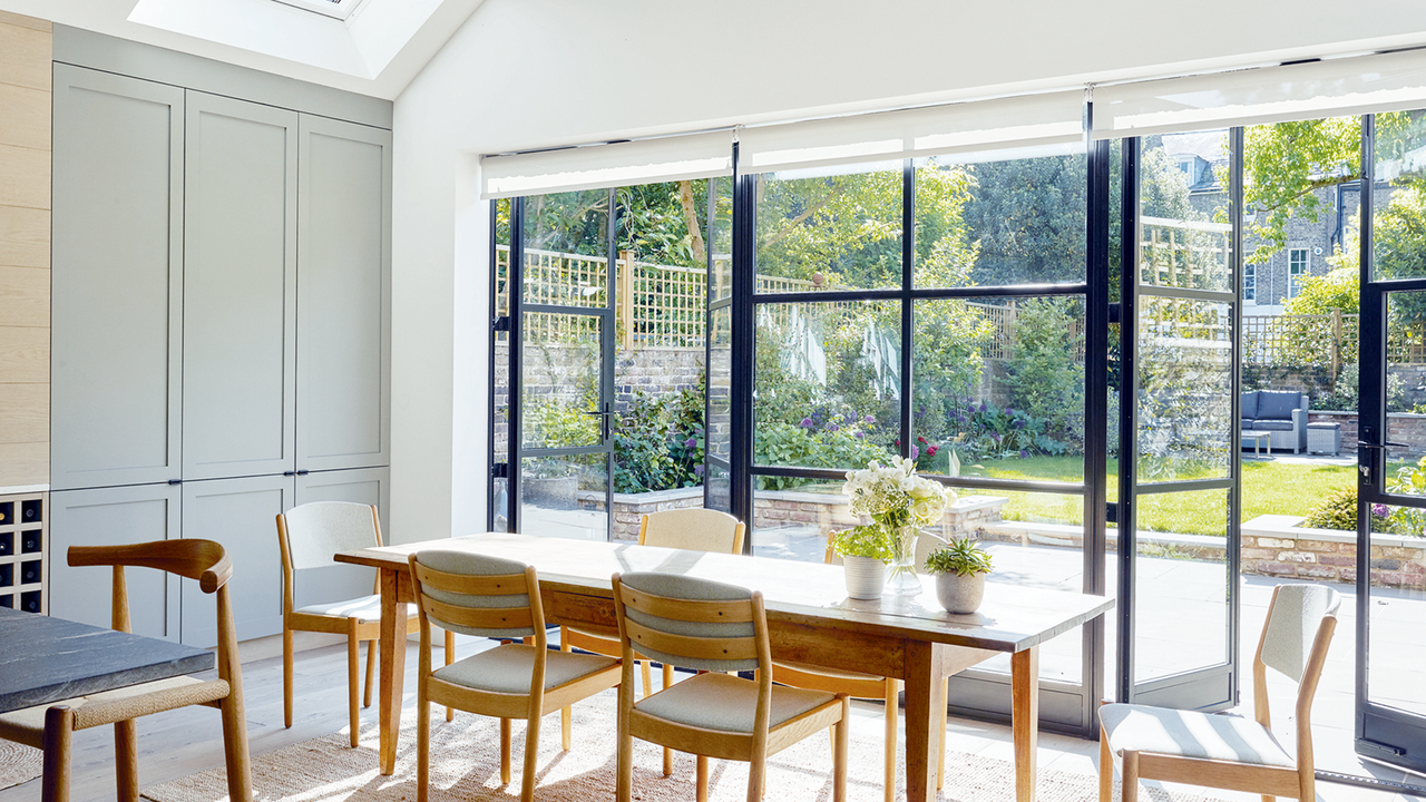 dining area with doors opening onto backyard