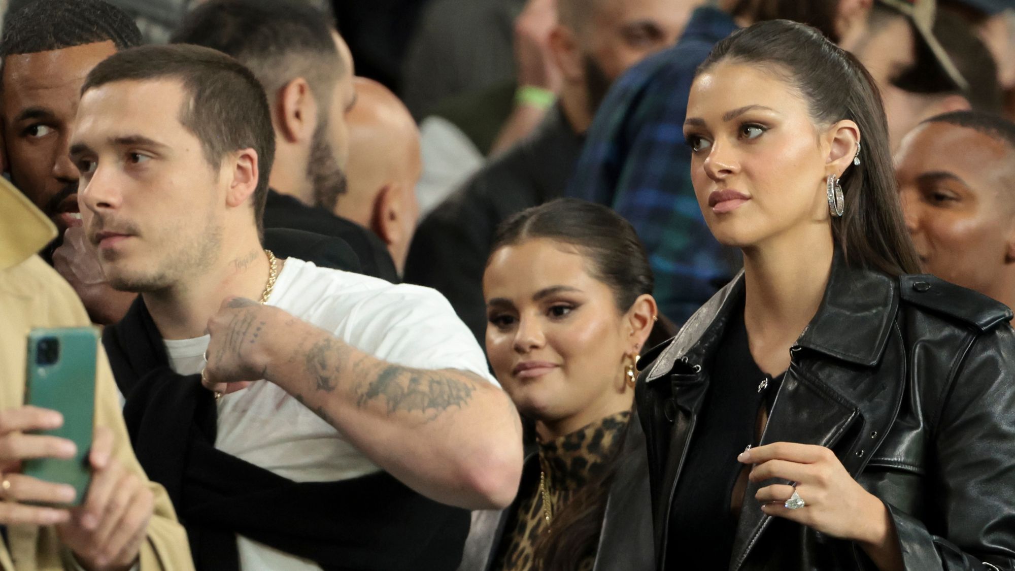 Brooklyn Beckham, Selena Gomez and Nicola Peltz at Parc des Princes in 2023