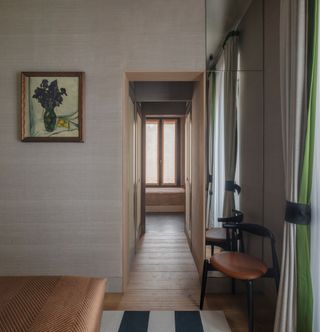 milan apartment living space interior with painting; interior design by Studio Luca Guadagnino