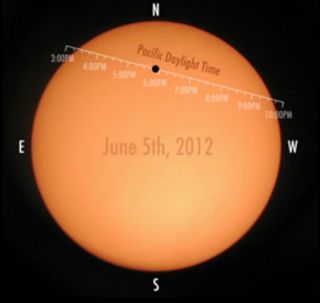 This still from a NASA video shows the position of Venus on the sun's disk in Pacific Daylight Time on June 5, 2012 during the last transit of Venus for 105 years.