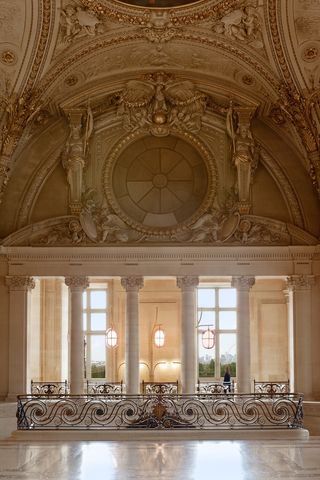 Cafe Mollen interior with Marble ceilings and marble relief work in cream and gold