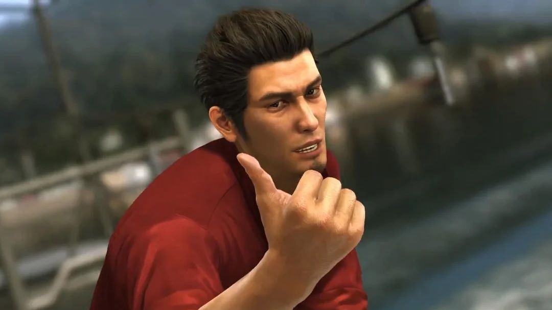 Kiryu gives a thumbs up to the screen.