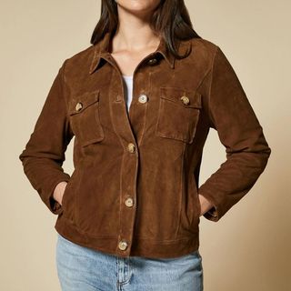 model wearing Marina Rinaldi suede jacket in brown
