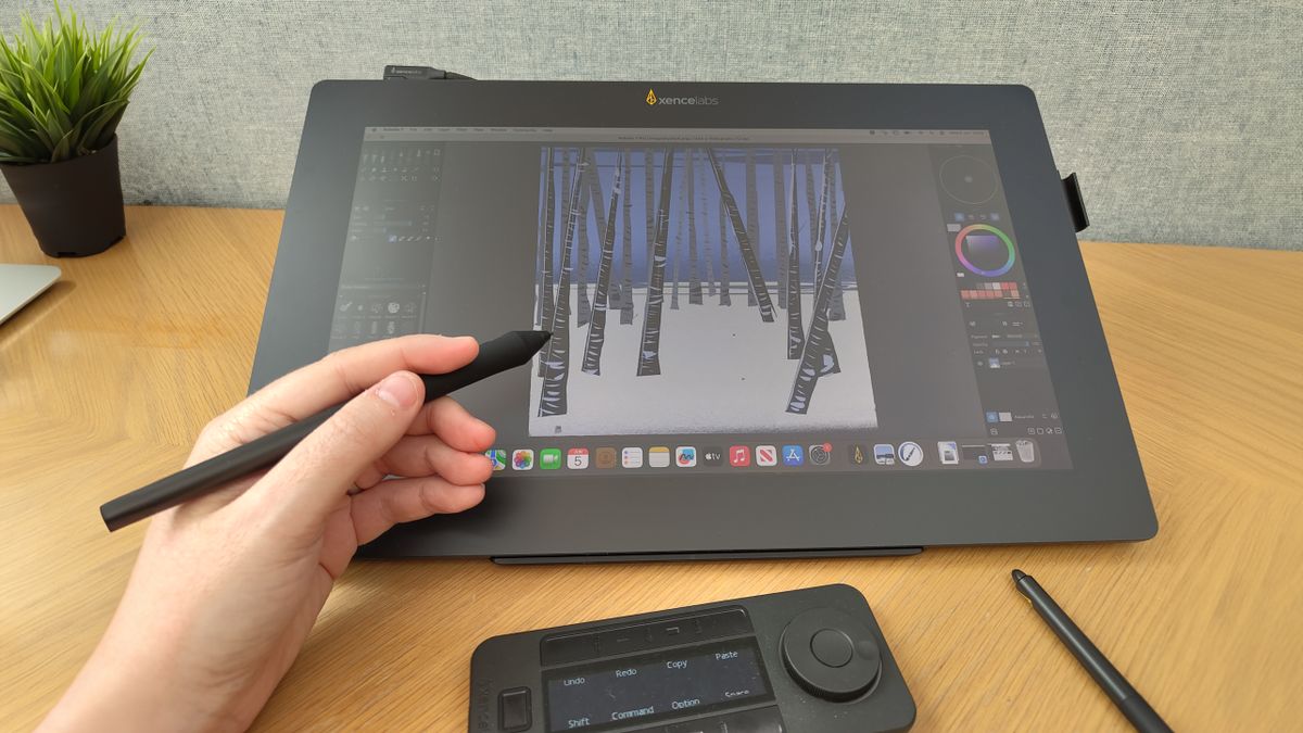 Xencelabs Pen Display 16 review; a pen display on a wooden desk