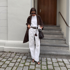 Mary wearing an all white outfit with jeans