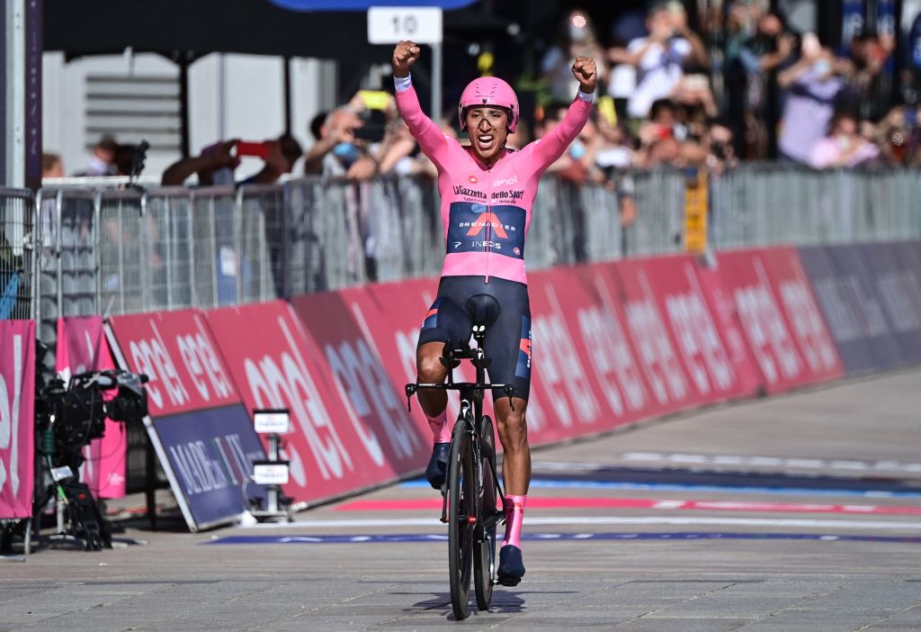 Overall leader Team Ineos rider Colombias Egan Bernal celebrates as he crosses the finish line to win the Giro dItalia 2021 cycling race after the 21st and last stage of the Giro dItalia 2021 cycling race a 303km individual time trial between Senago and Milan on May 30 2021 Photo by MIGUEL MEDINA AFP Photo by MIGUEL MEDINAAFP via Getty Images