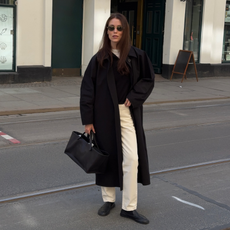 Annabel wearing a monochrome outfit with loafers