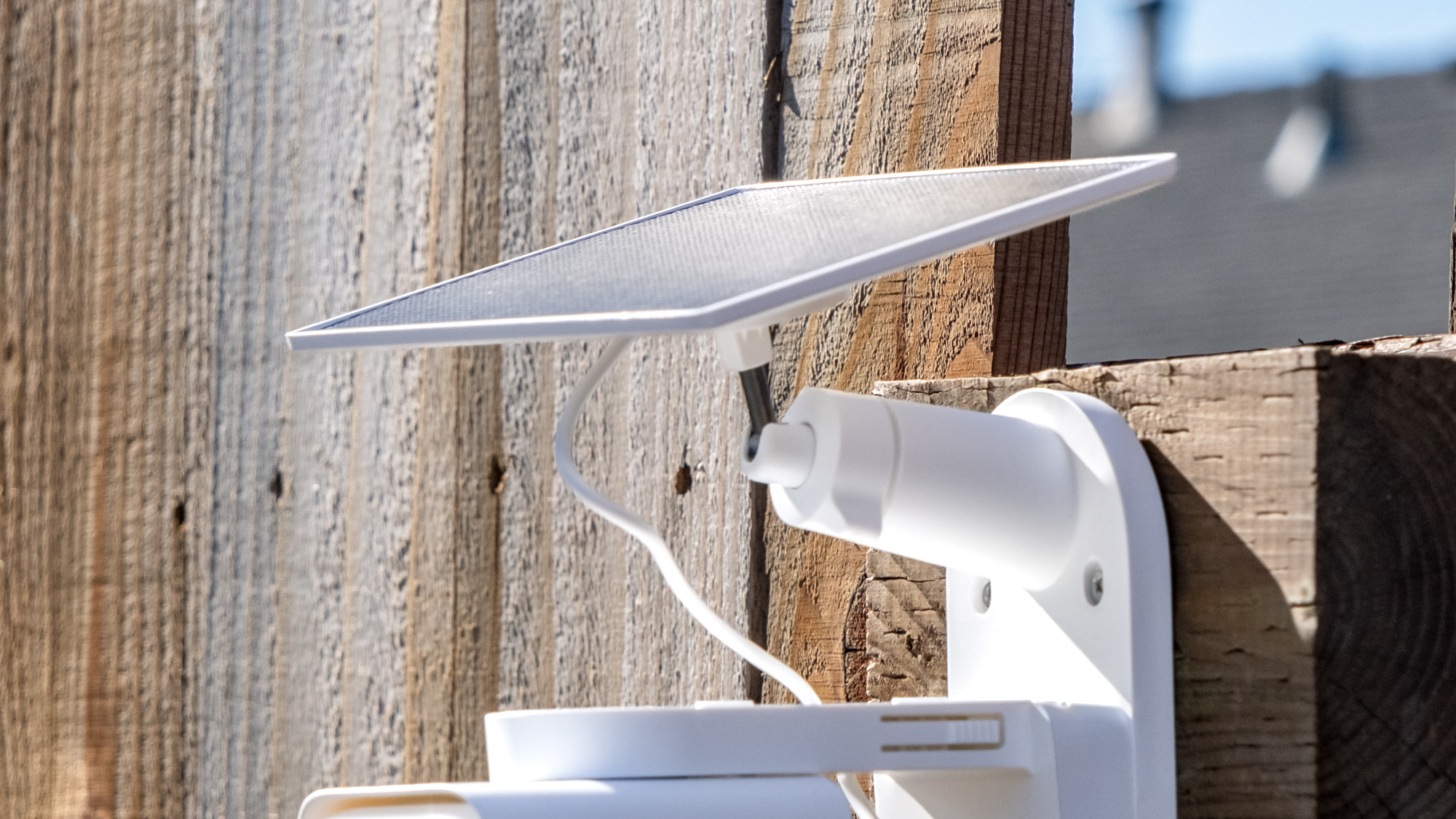 A TP Link Tapo C615F security camera mounted to a fence