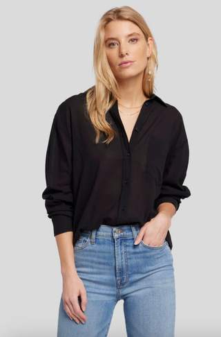 Woman wearing black shirt and jeans