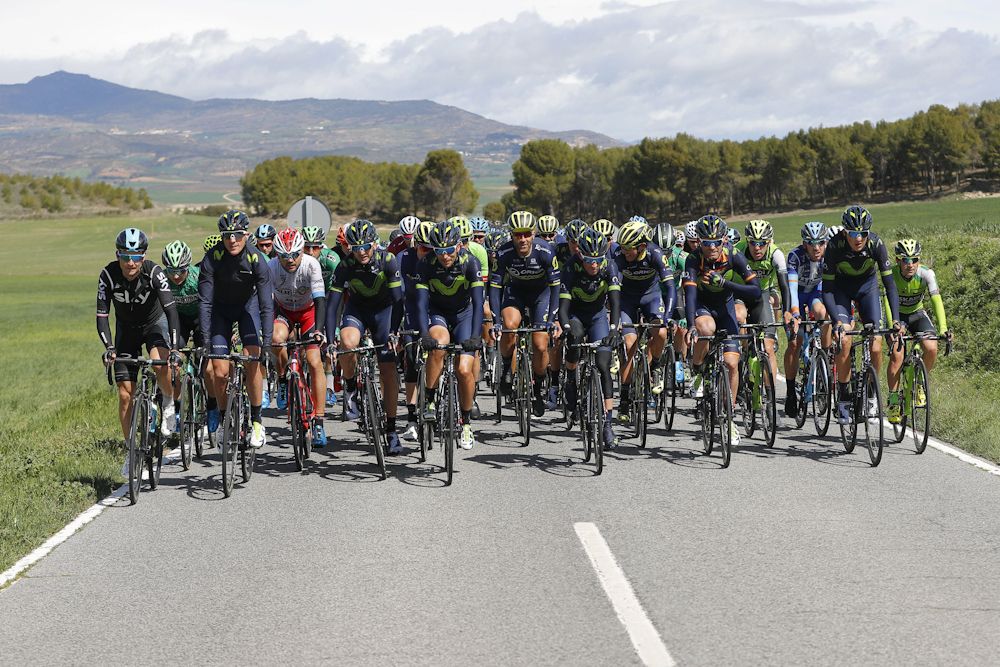 The peloton is spread across the road at GP Indurain