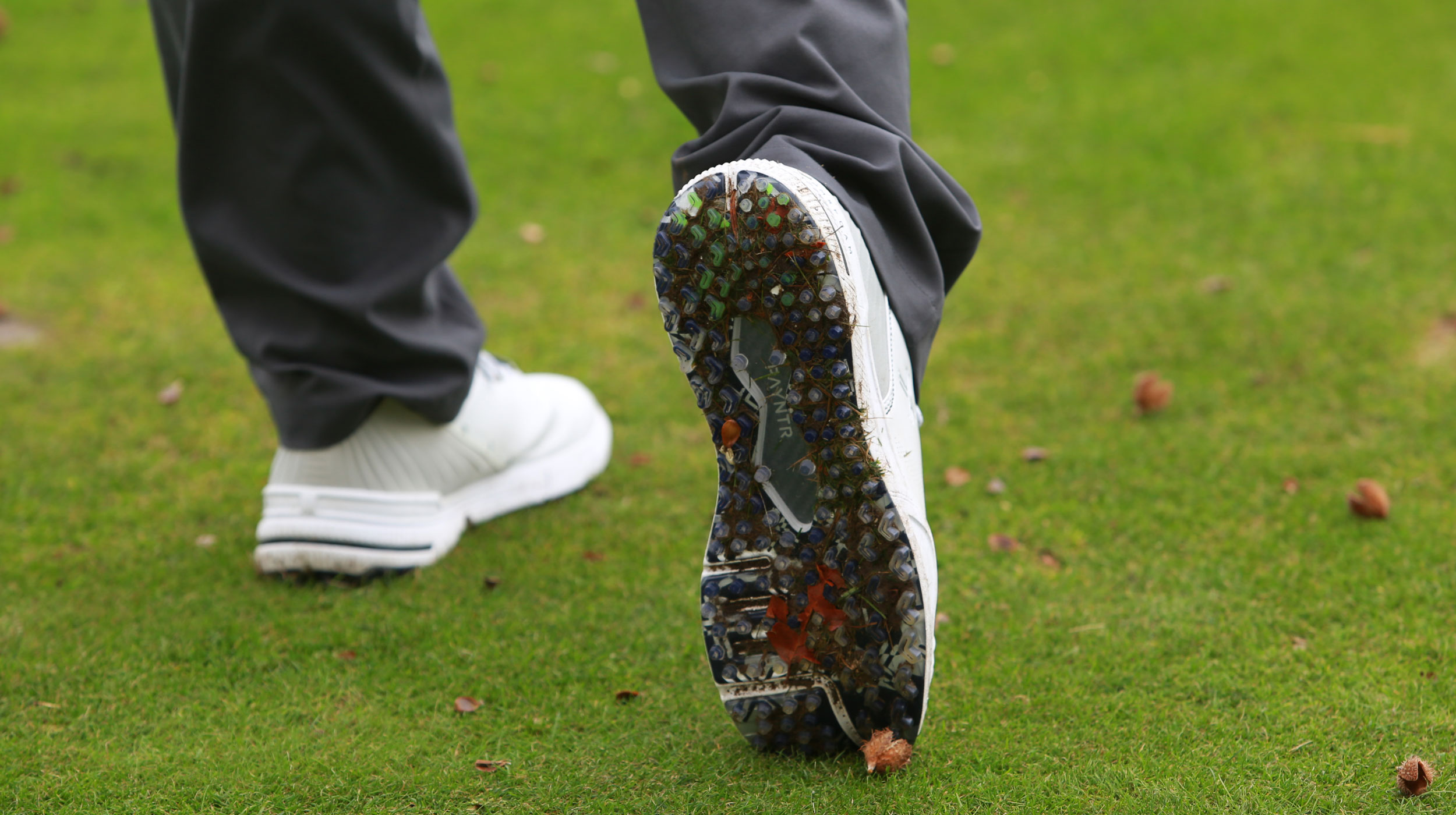 The soles of the Payntr X 005 F Spikless Golf Shoes