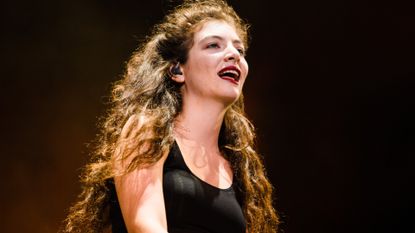 Lorde performing onstage